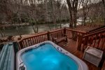 Soak Away In The Hot Tub Overlooking The River